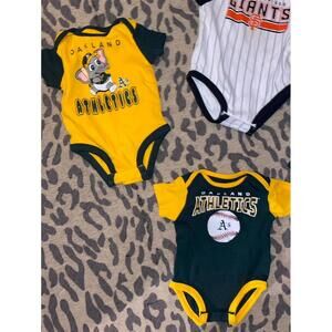 Oakland A’s and San Francisco Giants baby onesies